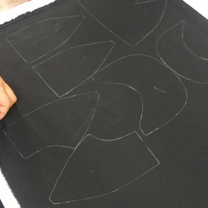 hat panel layout out on fabric